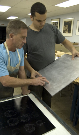 paul and oscar examining the printing plates